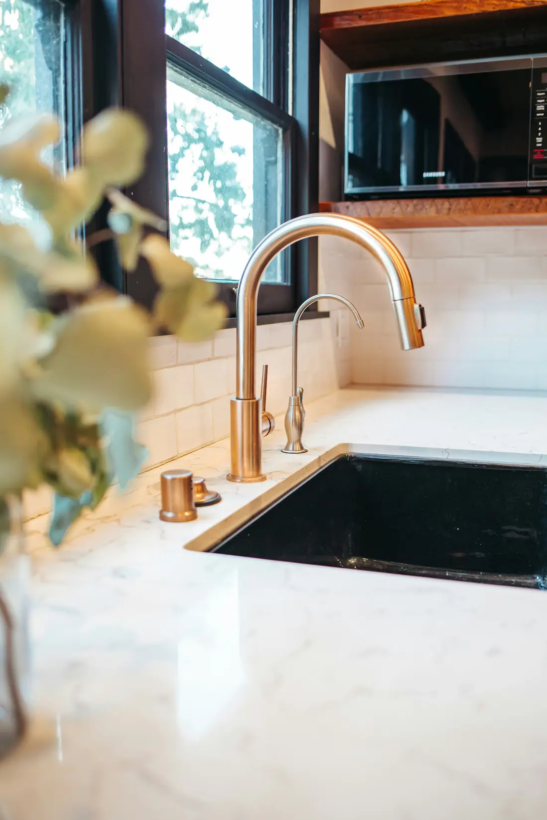 Filtered water at a kitchen faucet