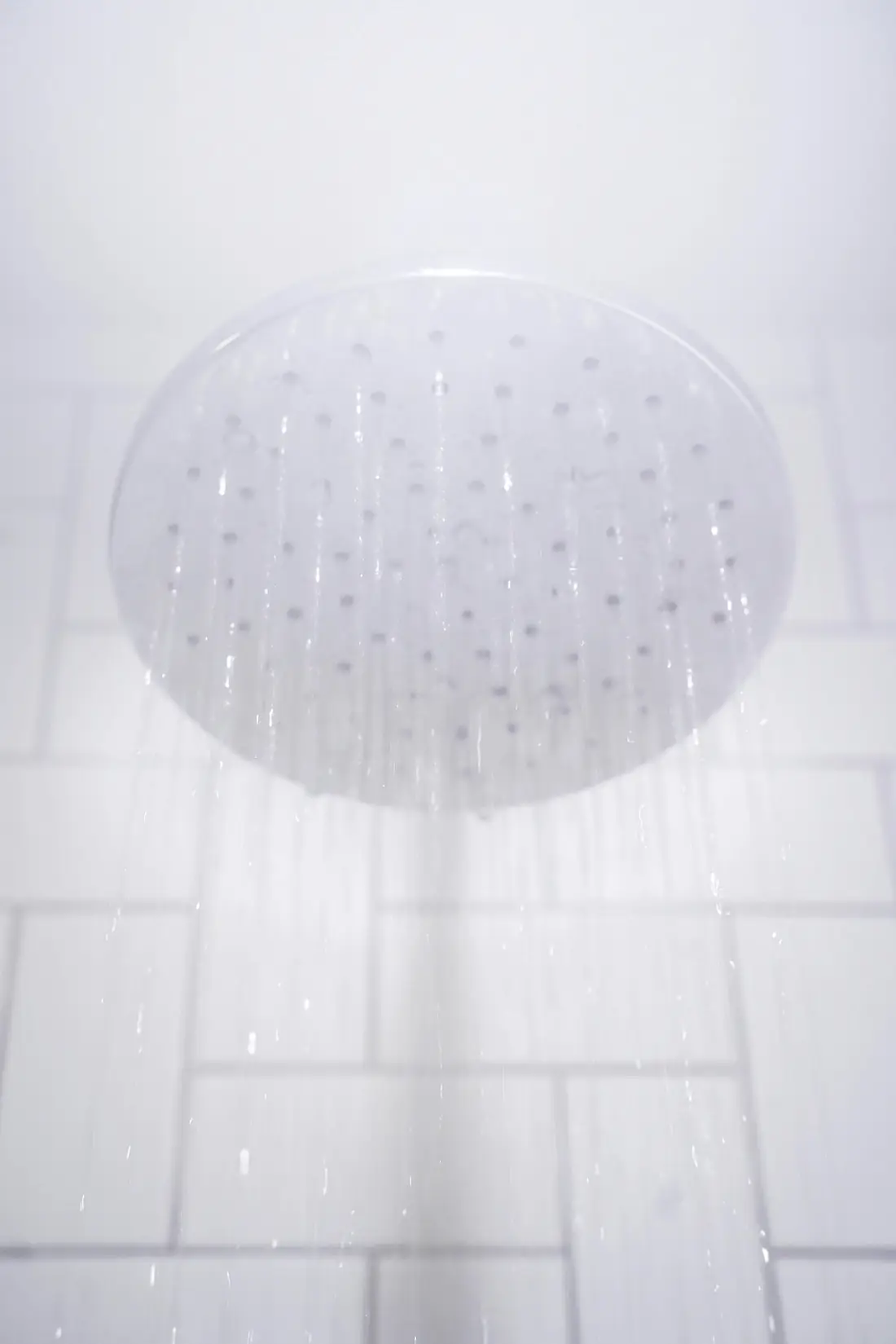 Hot water streaming from a rain shower head